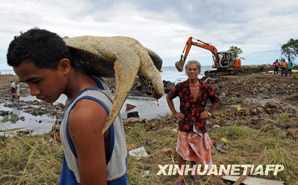 萨摩亚群岛地震和海啸死难人数升至155人[组图