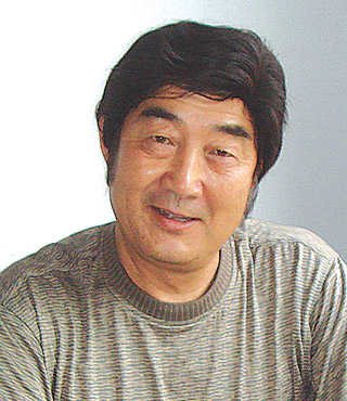 刘岩峰 胶东大鼓传人 烟台广播电视报创刊25周