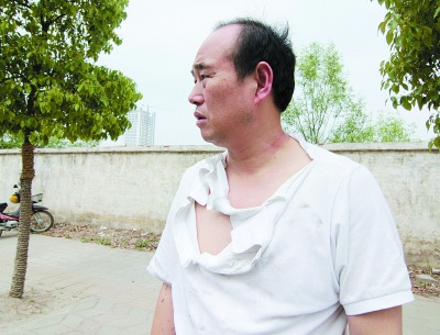 青年涉嫌酒后驾车殴打便衣交警(图) 法律新闻