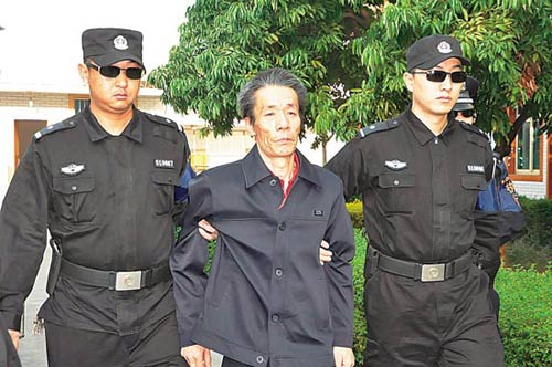 中级人民法院依法对2009年"10·18"故意杀人案罪犯李刚执行枪决