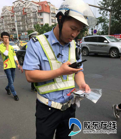 2015高考:烟台考生忘带身份证 交警15分钟送达