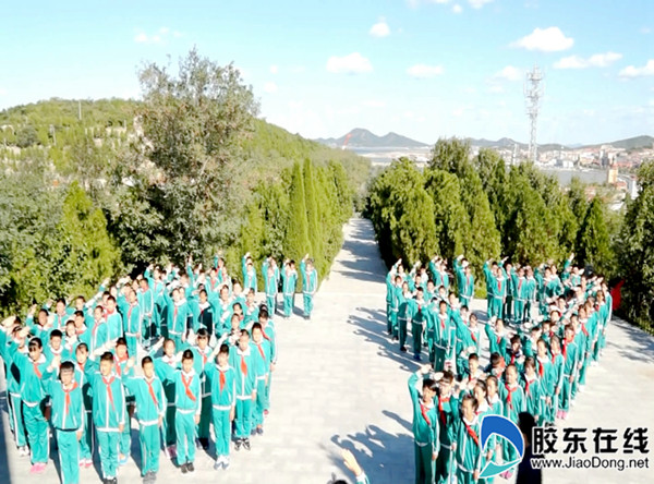 长岛县第一实验学校参加公祭活动_副本