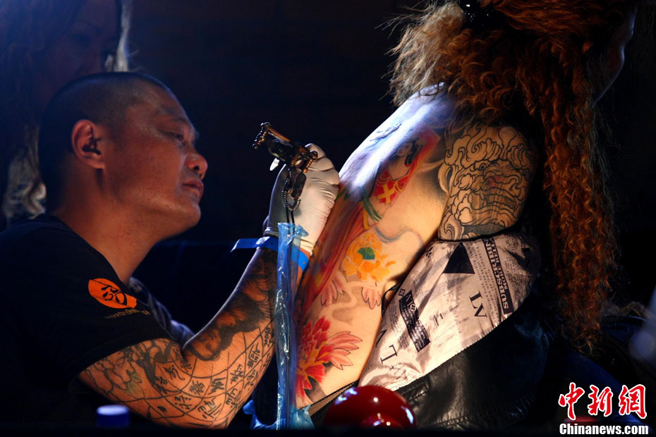 10月15日,中国(国际)纹身艺术节在北京798艺术区开幕,这是国内举办的