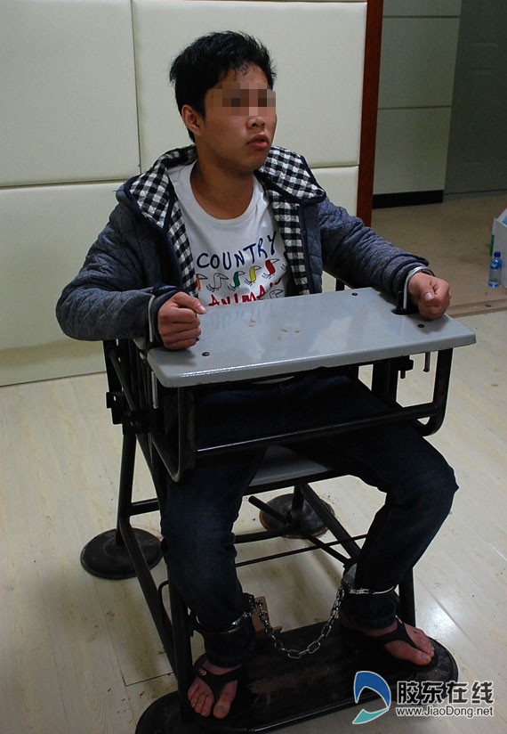 犯罪嫌疑人林贵在接受审讯