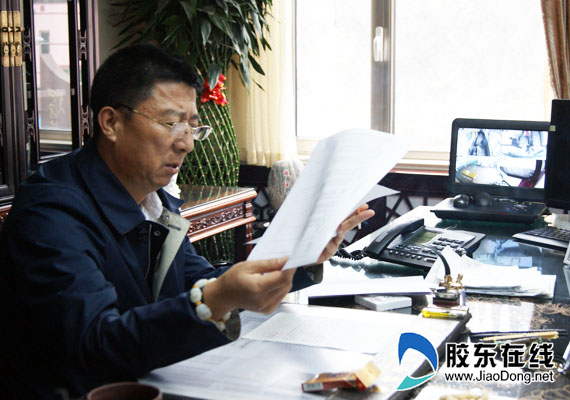 劳模风采:村支书王金勇和他的"桃花源"(组图)