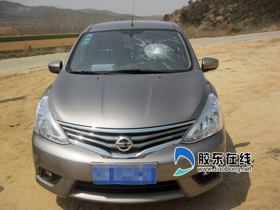 牟平日产车被砸 难道是为了爱国原来是为了爱人
