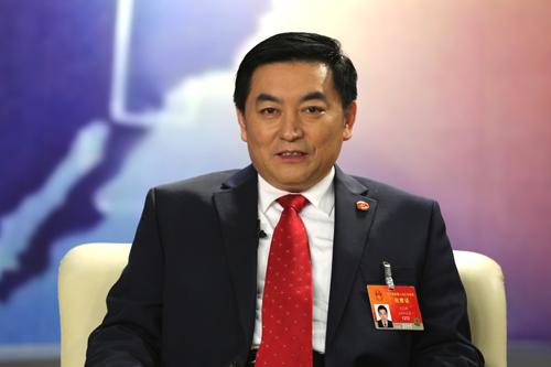 [点赞四个全面]⑩沈志强:贫困村换新貌 一年赶超六十年