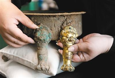 乒乓球冠军变身文物修复能手 还原青铜器原貌