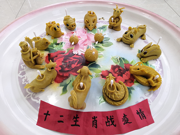 元宵抗"疫"正当时 巧手丹心制"灯碗"